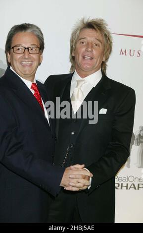 Rod Stewart with Rob Dickinson (Head of Music Industry Awards ) at the Music Industry Awards at the Grosvenor House Hotel in London. Stock Photo