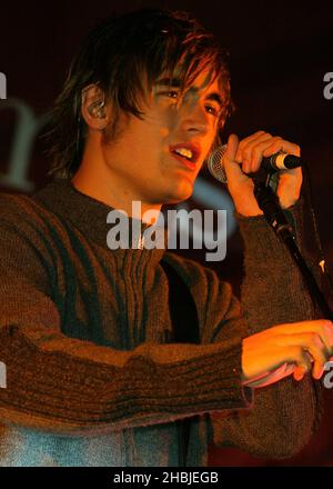 Busted; Charlie Simpson; attend and perform on stage at the annual Regent Street Christmas Lights switching-on ceremony, having performed live, in Regent Street on November 7, 2004 in London. Stock Photo