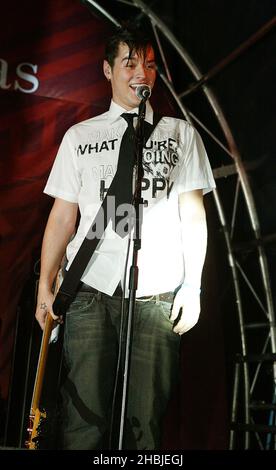 Busted; Matt Willis attends and perform on stage at the annual Regent Street Christmas Lights switching-on ceremony, having performed live, in Regent Street on November 7, 2004 in London. Stock Photo