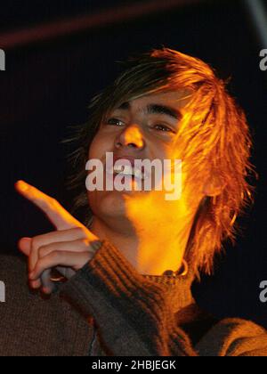 Busted; Charlie Simpson; attend and perform on stage at the annual Regent Street Christmas Lights switching-on ceremony, having performed live, in Regent Street on November 7, 2004 in London. Stock Photo