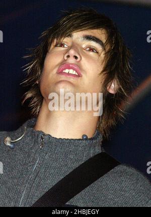 Busted; Charlie Simpson; attend and perform on stage at the annual Regent Street Christmas Lights switching-on ceremony, having performed live, in Regent Street on November 7, 2004 in London. Stock Photo