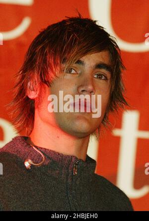 Busted; Charlie Simpson; attend and perform on stage at the annual Regent Street Christmas Lights switching-on ceremony, having performed live, in Regent Street on November 7, 2004 in London. Head Shot Stock Photo