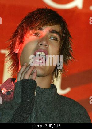 Busted; Charlie Simpson; attend and perform on stage at the annual Regent Street Christmas Lights switching-on ceremony, having performed live, in Regent Street on November 7, 2004 in London. Head Shot Funny Stock Photo