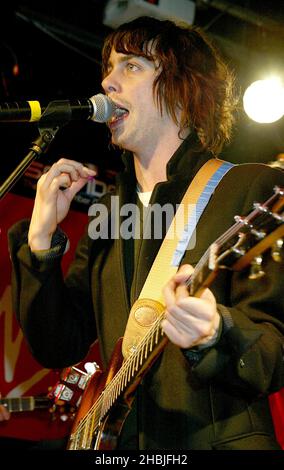 Johnny Borrell of London-based indie-rock band Razorlight play live and sign copies of their latest single 'Rip It Up', released November 29, at Virgin Megastore, Oxford Street on December 2, 2004 in London. Stock Photo