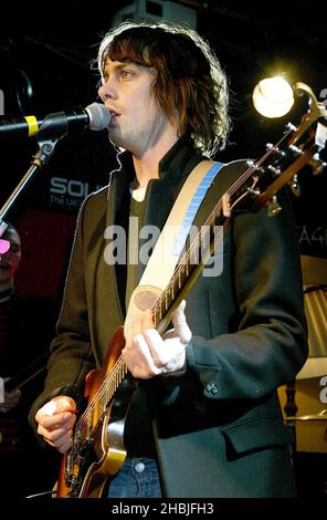 Johnny Borrell of London-based indie-rock band Razorlight play live and sign copies of their latest single 'Rip It Up', released November 29, at Virgin Megastore, Oxford Street on December 2, 2004 in London. Stock Photo