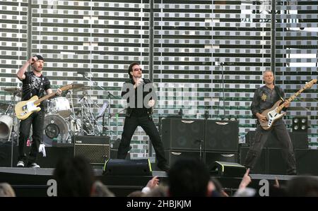 The Edge; Bono; Adam Clayton; Larry Mullen of U2 perform on stage on the first London night of their 'Vertigo//2005' World Tour at Twickenham Rugby Stadium on June 18, 2005 in London, Stock Photo