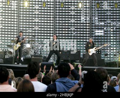 The Edge; Bono; Adam Clayton; Larry Mullen of U2 perform on stage on the first London night of their 'Vertigo//2005' World Tour at Twickenham Rugby Stadium on June 18, 2005 in London, Stock Photo