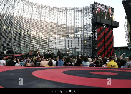 The Edge; Bono; Adam Clayton; Larry Mullen of U2 perform on stage on the first London night of their 'Vertigo//2005' World Tour at Twickenham Rugby Stadium on June 18, 2005 in London, Stock Photo