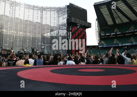 The Edge; Bono; Adam Clayton; Larry Mullen of U2 perform on stage on the first London night of their 'Vertigo//2005' World Tour at Twickenham Rugby Stadium on June 18, 2005 in London, Stock Photo