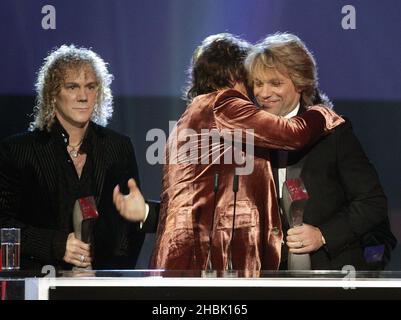 (left-right) David Bryan, Richie Sambora and Jon Bon Jovi of rock group Bon Jovi are inducted into the UK Music Hall of Fame inside Alexandra Palace in north London, November 14, 2006. An international line up of music legends and celebrities were gathering to for 2006's UK Music Hall of Fame Induction Ceremony, hosted by Dermot O'Leary. Stock Photo