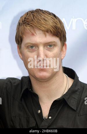 Josh Homme of Queens of the Stone Age pose backstage at the O2 Wireless Festival at Hyde Park, London. Stock Photo