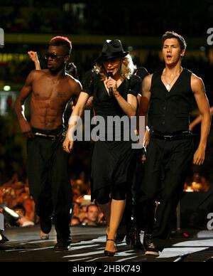 Madonna performs during the charity concert at Wembley Stadium, London. Stock Photo