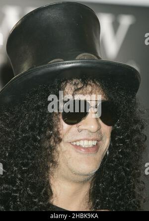 Former Guns N' Roses guitarist Slash signs copies of his autobiography ' Slash' at Waterstone's in Piccadilly, London Stock Photo - Alamy