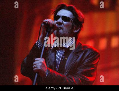 Shane MacGowan of The Pogues performs on stage at the Carling Academy in Brixton, London. Stock Photo