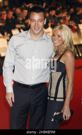 John Terry and wife Toni Poole arrive for the UK Premiere of Rambo at the Vue West End, London Stock Photo
