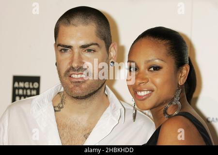 Shane Lynch and of Boyzone and wife Sheena arrive at Ronan Keating's Emeralds & Ivy Ball for Cancer Research UK at Battersea Evolution, London. Stock Photo