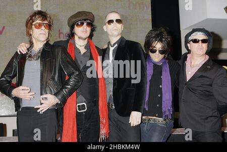 David Johannsen, Sami Yaffa, Brian Delaney, Steve Conte and Sylvain Sylvain of The New York Dolls pose at an instore signing at HMV on Oxford Street in central London. Stock Photo