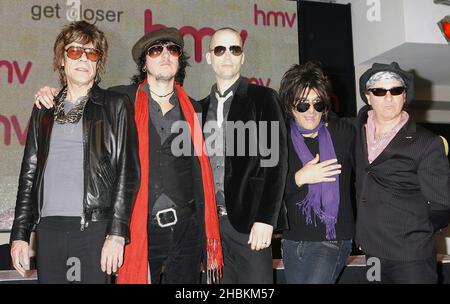 David Johannsen, Sami Yaffa, Brian Delaney, Steve Conte and Sylvain Sylvain of The New York Dolls pose at an instore signing at HMV on Oxford Street in central London. Stock Photo