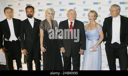 (L-R) Geordie Greig, Evgeny Lebedev, Anastasia Virganskaya, Mikhail Gorvachev, JK Rowling, and Aalexandre Lebedev arrive at the Raisa Gorbachev Foundation Annual Fundraising Gala Dinner at Stud House, Hampton Court, London. Stock Photo