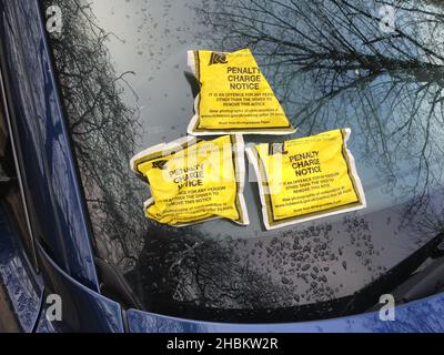 Multiple parking ticket / tickets issued to one car committing an offence over a period of three days by the London Borough of Richmond upon Thames.  (127) Stock Photo