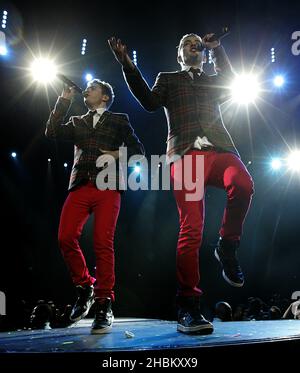 John and Edward Grimes, aka Jedward, performing during Capital FM's Jingle Bell Ball at the O2 Arena in London. Stock Photo