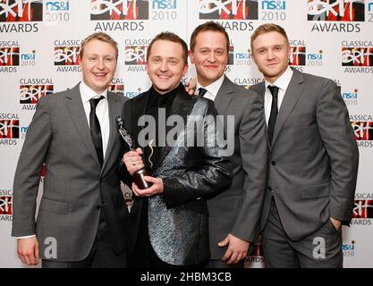 Only Men Aloud pose with the NS&I Album of the Year Award in the Awards Room at the Classical Brit Awards at the Royal Albert Hall, London. Stock Photo