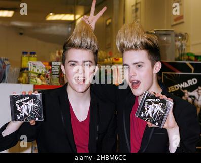 Jon and Edward Grimes aka Jedward sign new album at Tesco in Brent Park, London. Stock Photo