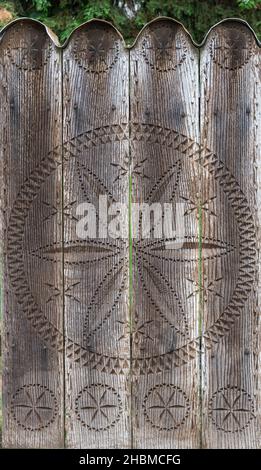 Detail of a old and beautifully carved wooden door Stock Photo