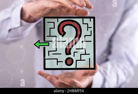 Decision concept between hands of a man in background Stock Photo