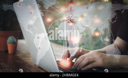 Business man hand working on laptop computer concept with social media diagram. Stock Photo