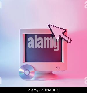 Old monitor retro computer cd disk and mouse cursor in vaporwave and neon light Stock Photo