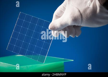 Transparent solar panels for use as window glass to generate electricity from sunlight. Stock Photo