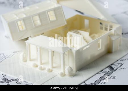 Decomposed house parts floor and roof 3D model printed on a 3D printer with white filament by FDM technology for architectural use Stock Photo
