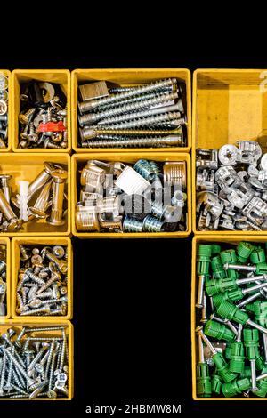 A set of bolts and self-tapping screws for mounting and assembling furniture for home and office Stock Photo