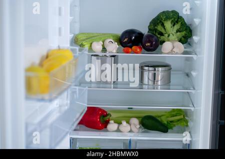 Picture of the fridge with food inside Stock Photo