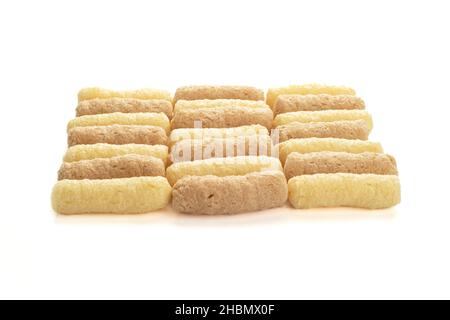 Selective focus on sweet corn and buckwheat sticks on a white background. Focus on the middle row of the stick. Copy space. Stock Photo