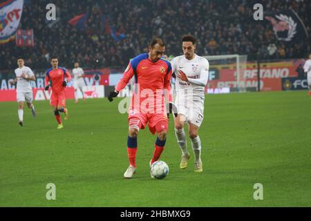 BUCHAREST, ROMANIA - December 15, 2021: Football match between FCSB and Rapid 1923 old on National Arena in League 1. Stock Photo