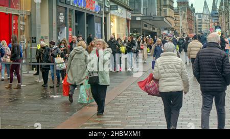Glasgow, Scotland, UK. 20th Dec, 2021. Christmas shopping saw little Christmas cheer on a grey day where lights abd shopping where the only sign of the holiday. Credit: gerard ferry/Alamy Live News Stock Photo