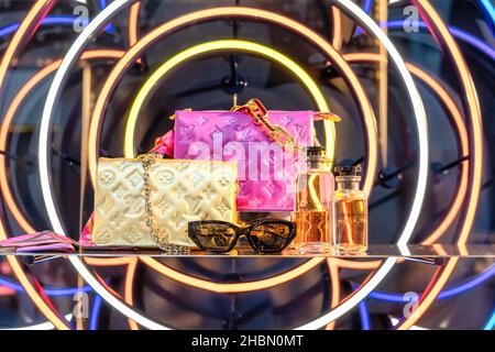 Yves Saint Laurent or YSL women's purse and other items on a store window in the Yorkdale Shopping Mall which is one of the largest and most expensive Stock Photo