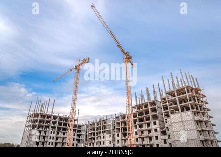 Crane and new residential highrise houses Stock Photo