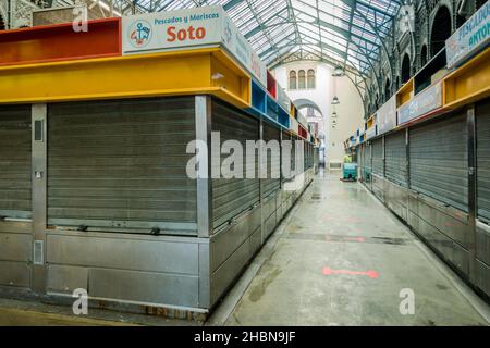 Closed stalls of vendors in Atarazanas covered Market, Malaga, Andalucia, Spain.