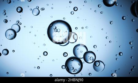 Pure clear 3d water bubbles in blue background flow in air with copy space background Stock Photo