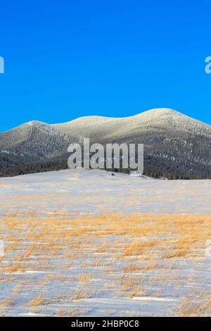 black mountain along the continental divide in winter near avon, montana Stock Photo
