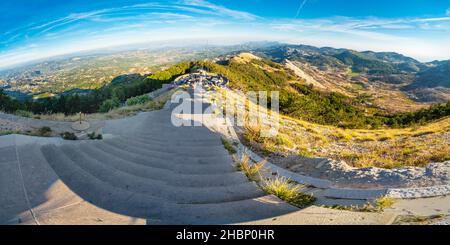 Lovcen National Park,Montenegro-September 14 2019: Wide angle shot,at sunset,visitors climb up these steps,towards a long tunnel,cut through the mount Stock Photo