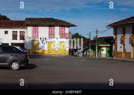 SALENTO, COLOMBIA - JULY 2021. Beautiful street and facades of the houses of the small town of Salento located at the region of Quindio in Colombia Stock Photo