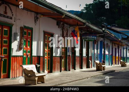 SALENTO, COLOMBIA - JULY 2021. Beautiful street and facades of the houses of the small town of Salento located at the region of Quindio in Colombia Stock Photo