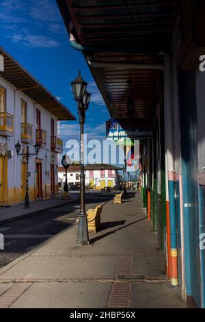 SALENTO, COLOMBIA - JULY 2021. Beautiful street and facades of the houses of the small town of Salento located at the region of Quindio in Colombia Stock Photo