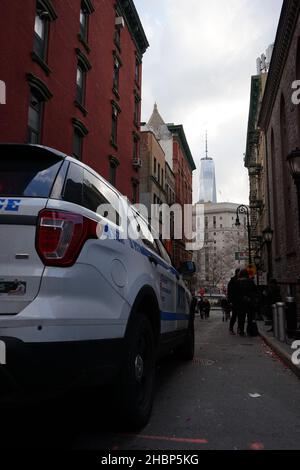 NEW YORK CITY, UNITED STATES - Feb 18, 2019: A vertical shot of a busy street with an NYPD car in New York City, United States Stock Photo