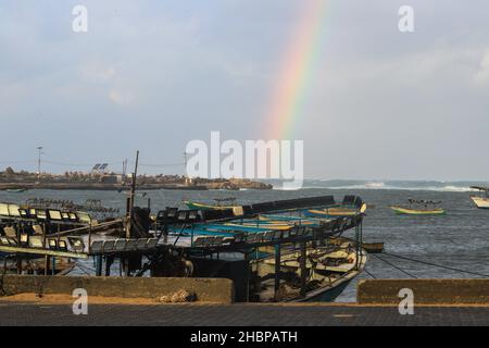 Gaza, Palestine. 20th Dec, 2021. General view of a rainbow in the sky above the Mediterranean Sea during a winter storm in Gaza City. Credit: SOPA Images Limited/Alamy Live News Stock Photo