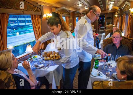 Interior of restaurant car railway carriage of Transcantabrico Gran Lujo luxury train travellong across northern Spain, Europe. First Class dining are Stock Photo